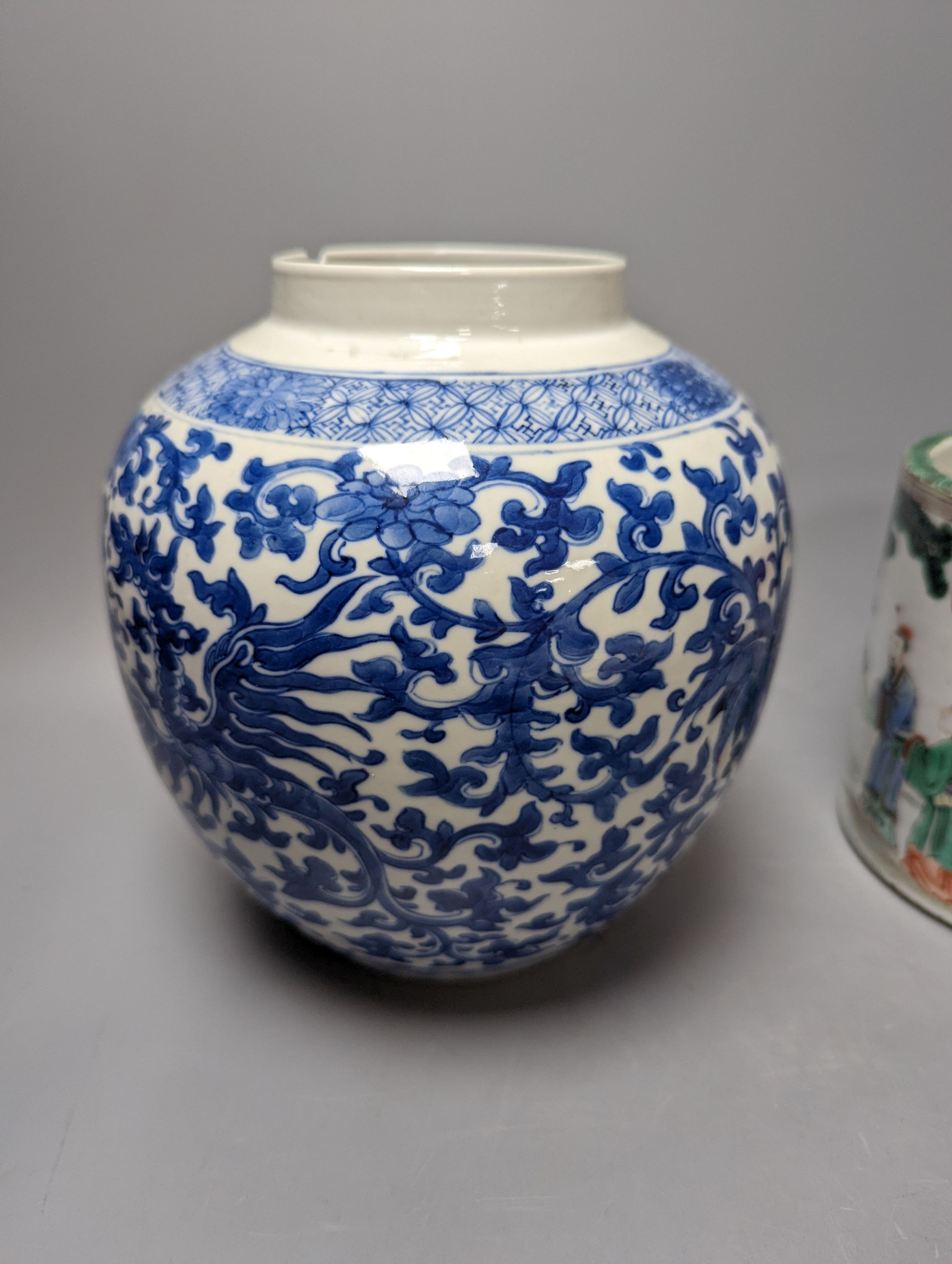 An Imari Japanese dish, a blue and white phoenix jar, and a famille verte brush pot with officials. Largest 29cm diameter